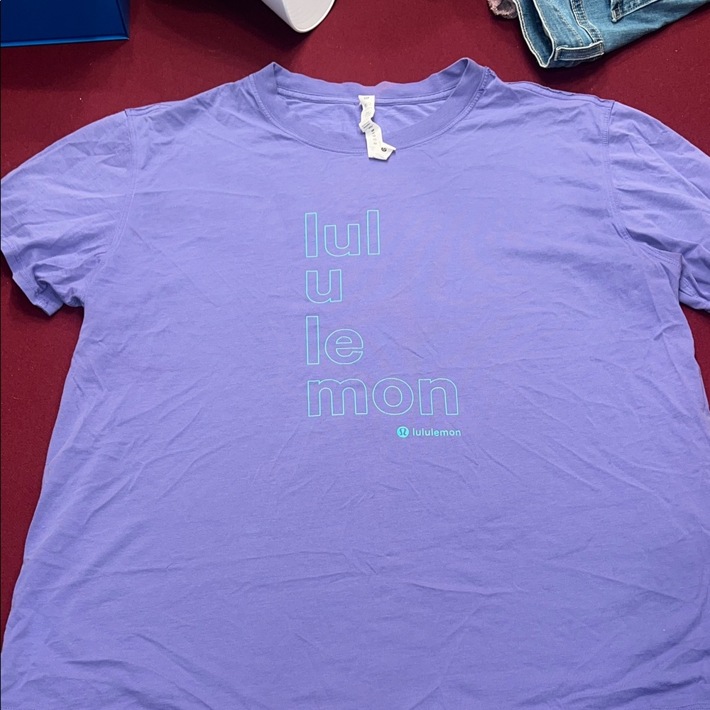 Lululemon Lavender Tee with Teal Logo